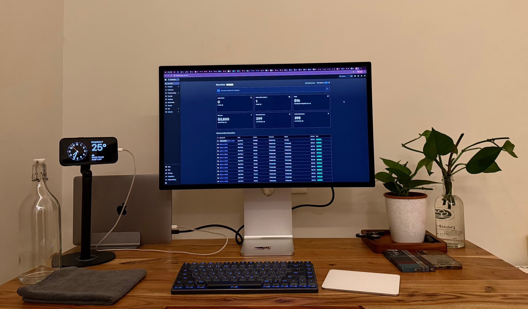 My desk: a walnut standing desk with an Apple Studio Display XDR